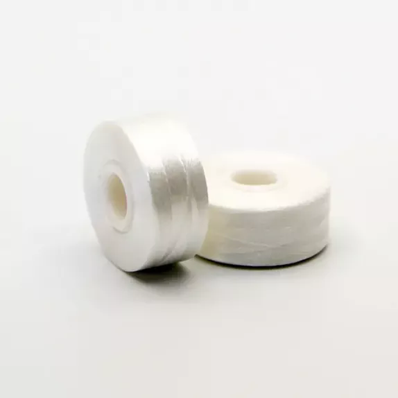 De unde pierderile ascunse ale fabricii de broderie provin din firul de bobină substandard?